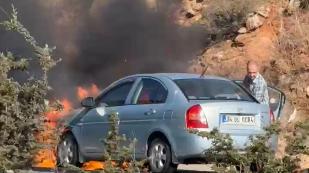 Bursa'da yanan aracı için çaresizce çırpındı