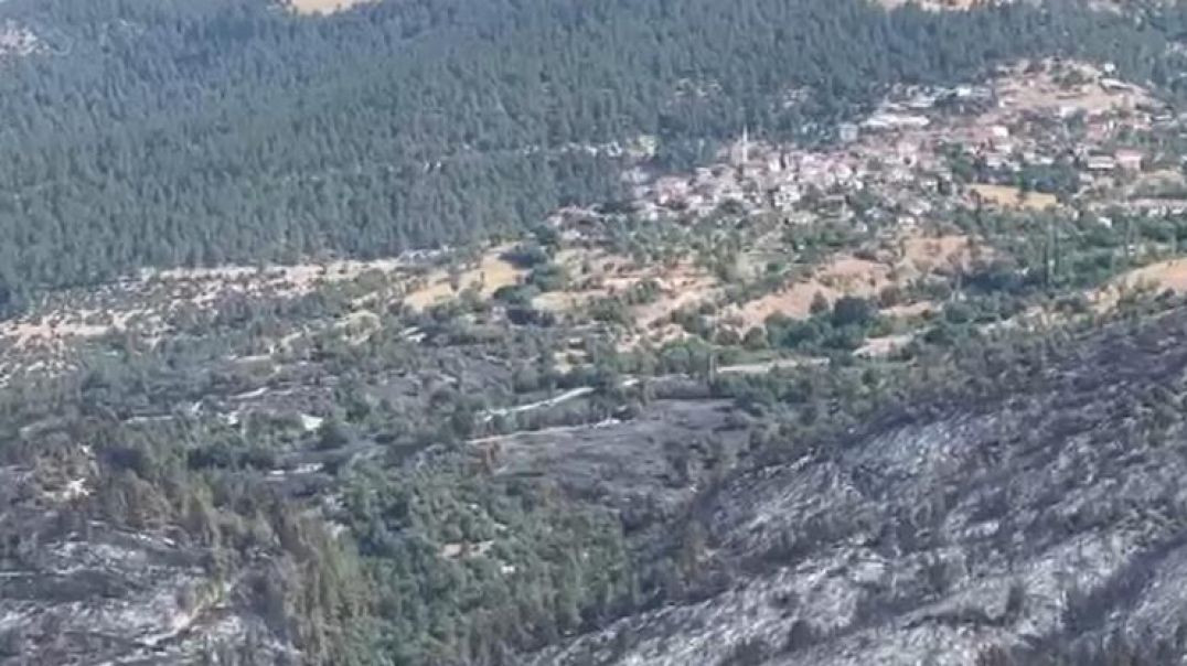 Bursa'da başlayıp Balıkesir'de devam eden orman yangınında soğutma çalışmaları sürüyor